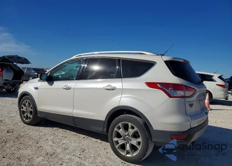 2015 Ford Escape Titanium z USA, uszkodzony, nr VIN 1FMCU0J95FUA31286